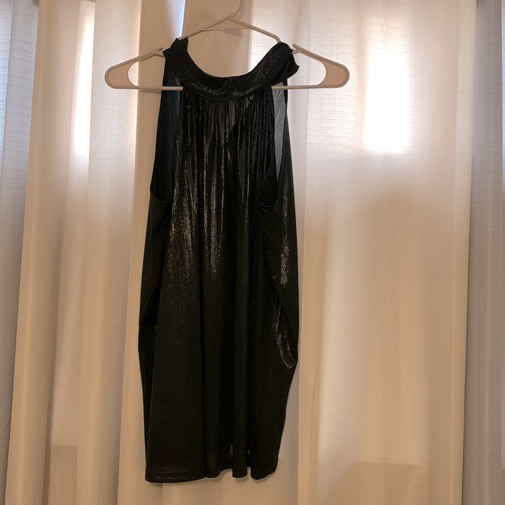 Never worn. Beautiful Shimmer halter top.
